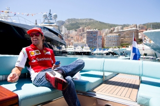Monte Carlo, Monaco. Friday 23 May 2014 Fernando Alonso relaxes on a boat in the harbour. Copyright Photo: Lorenzo Bellanca/Ferrari